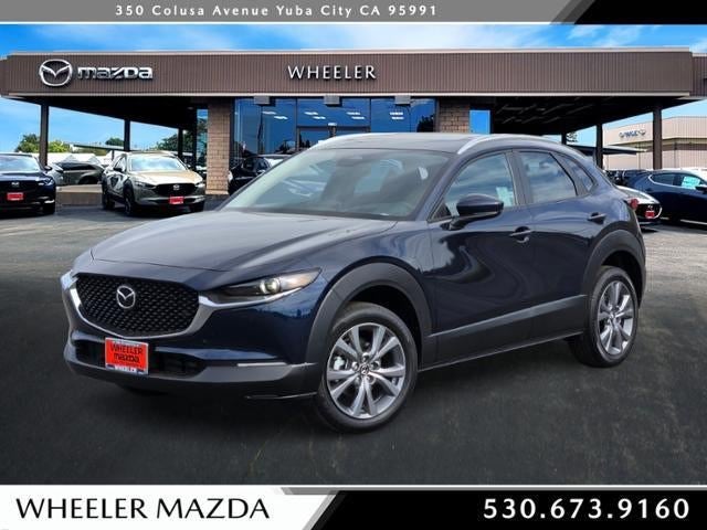 2026 Mazda Mazda CX-30 2.5 S Premium AWD in Deep Crystal Blue Mica — front three-quarter view