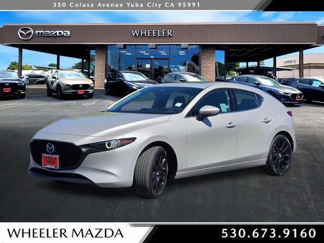 2026 Mazda Mazda3 Hatchback 2.5 S Premium in Platinum Quartz Metallic — front three-quarter view
