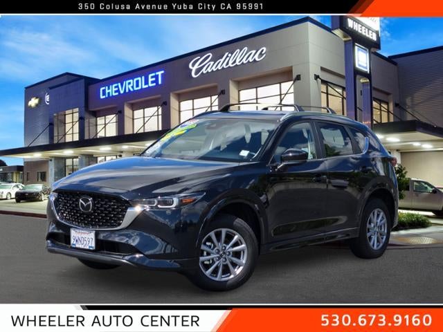 2025 Mazda Mazda CX-5 2.5 S Preferred Package AWD in Jet Black Mica — front three-quarter view